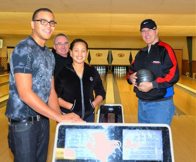 Enoying our family tradition of bowling